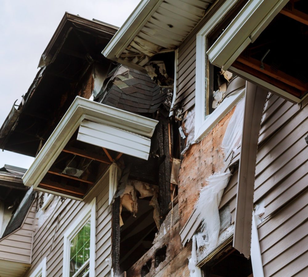 The house after a fire burned house Ruined abandoned burnt-out wooden house